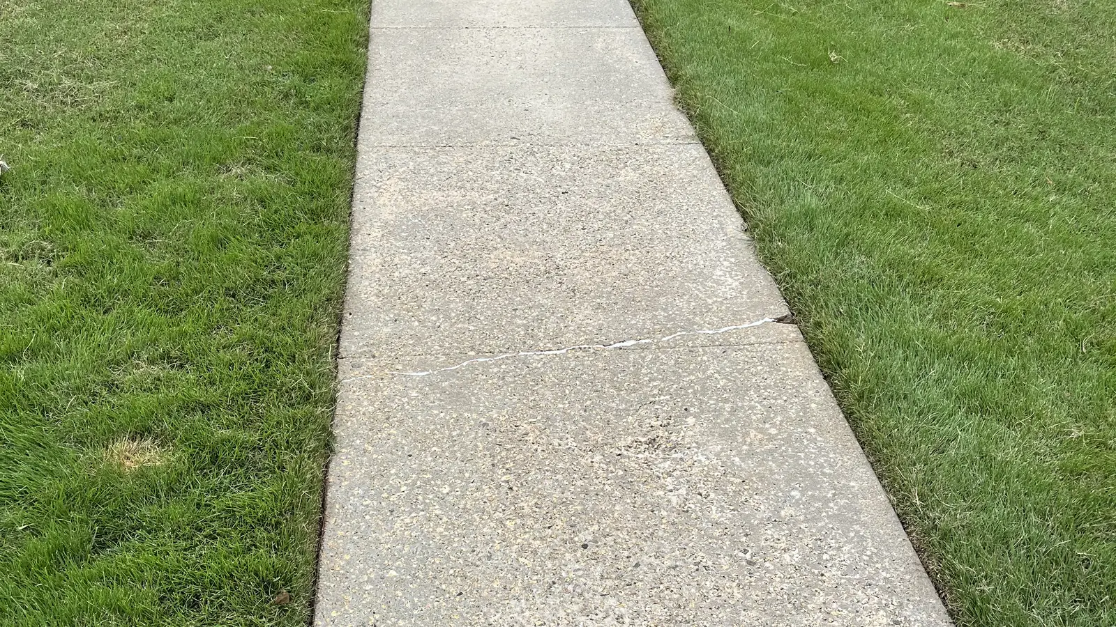 Front walkway pressure washed clean by Pure Heart Cleaning Solutions in Carrollton, GA