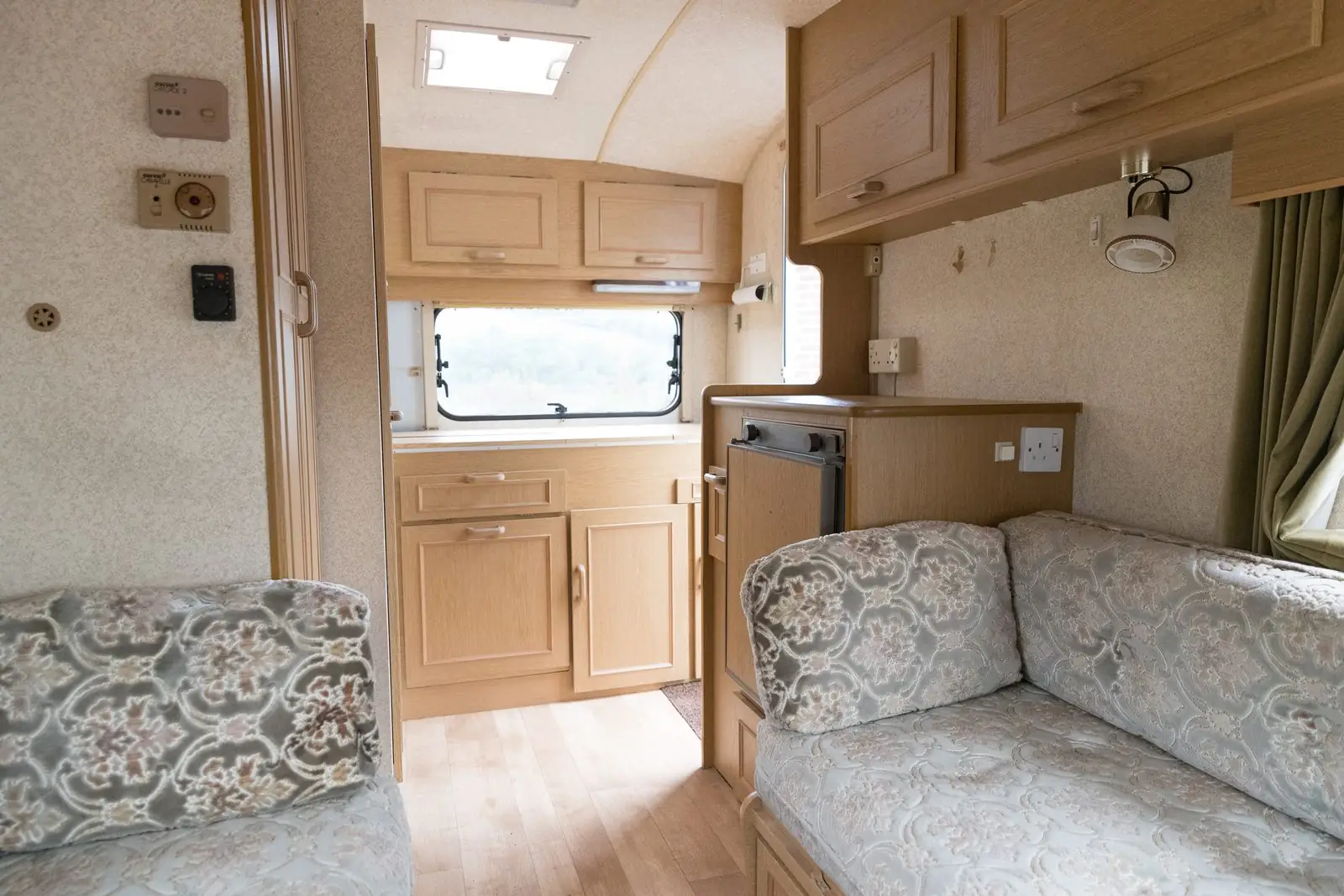 Cleaned RV interior with galley, dinette and sleeping area in Carrollton, GA